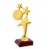 The award figure "Three stars", the plastic stand is red, 15 x 7 x 6 cm.