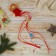 Soft suspension "Angel - a train with snowflakes" 10*8 cm red