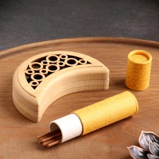 A set of incense with a stand 