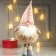 Interior doll "Grandpa in a fur coat and pink cap" 48x16x21 cm