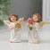 Polystone souvenir "Angel in a dress with flowers/gift" mix 6x4.5x3.5 cm