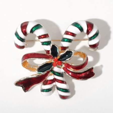 Brooch "Lollows" with a bow, color in gold-1