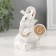 Souvenir Ceramics "Elephant with a coin - a ruble" White with gold 5.8x6.5x9.5 cm
