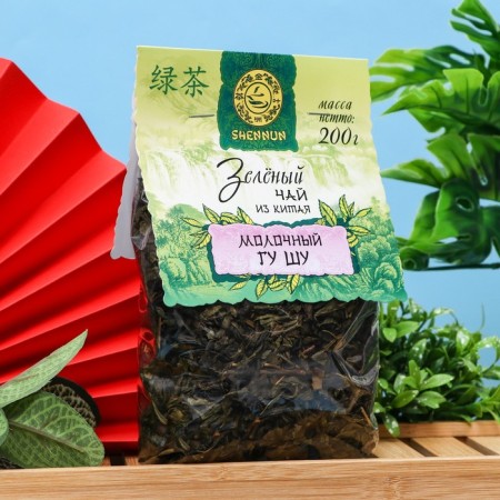 Green Chinese large -leaf tea in the transparent package Shennun, Milk Gu Shu, 200 g