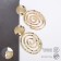 Earrings Metal "Gate" two ovals, color gold