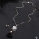 Set 2 objects: earrings, pendant pearl pearl pearl, white-black color in gold, 50 cm
