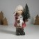 Souvenir ceramics Light "Baby in a red coat, with a Christmas tree and a elk" 10.5x8.5x19 cm