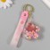A keychain plastic with a carbine, a strap "Flower with balls" Water with decor 6x6x2 cm