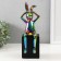 Souvenir Ceramics "Rabbit holds ears" Green chameleon 7.8x10x27 cm