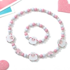 Set of children's “chosen” 2 subjects: beads, bracelet, lamb, white-pink color