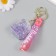 A plastic keychain with a carbine, a strap of "backpack" water with decor1.8x5.3x5.6 cm