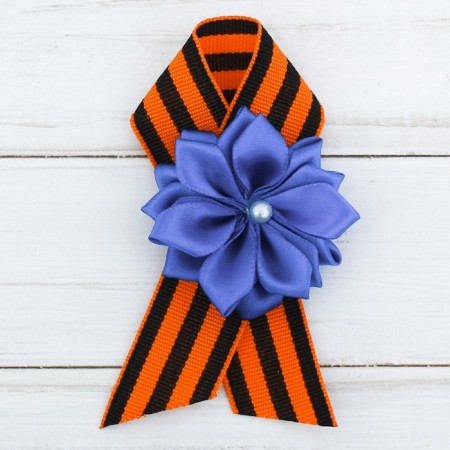 Icon with tape and blue flower on Victory Day "May 9"-1
