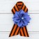 Icon with tape and blue flower on Victory Day "May 9"