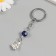 Keychain from the evil eye Metal "fig" 2.5x4 cm