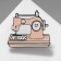 The icon "sewing machine" with the heart, white-pink color in ferrous metal