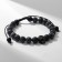 Bracelet male "skull" with beads on threads, color gray color