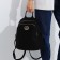 Women's backpack made of artificial leather with a zipper Star Bag, 5 outer pockets, black color
