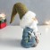 Polystone souvenir "Santa Claus in a blue fur coat with animals" 9x12x30 cm