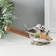 Souvenir Polystone "Sinichi on a shovel, with flowers" 17x5x7 cm