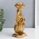 Summary Polystone stand "Filin Genrich Puccity with a flower" Bronze 21x8.5x12 cm