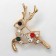 Brooch "Deer" baby, colored in gold