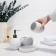 A set of accessories for the bathroom "Camelia", 4 items (450 ml dispenser, soap dish, 2 glasses), white color
