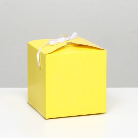 The box is folding, square, yellow, 12 x 12 x 12 cm,