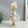 Interior doll "Baby with a bow in hair, with a flower" 35x13.5x20 cm