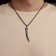 Pendant men's “fang” carved, color silver on a black lace, 50 cm