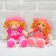 Soft doll "Girl's skirt in a flower", color mix