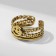 Ring "Smiley" trend, color black gold, dimensionless