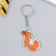 PVC keychain "Squirrel with a gift" soft 3x4 cm