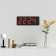 Electronic wall clock, with an alarm clock, 33.7 x 11.4 x 4.5 cm, red numbers