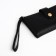 Women's wallet on the button, black color