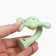 Silicone teether with a rattle "Baby", green color, crumb me