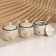 A set of ceramic cans for spices on a metal stand “Flowers”, 200 ml, 3 pcs, white color
