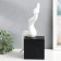Bending holder "Bely" White on the black cube 18x18x40 cm
