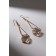 Hanging earrings with rhinestones "drop with a rhombus", white color in pink gold, 7.2 cm