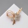 Brooch "Cinter" with bead and flowers, white color in gold