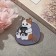 Icon "cat" with a tablet, colored in ferrous metal