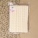 Knitted lace, 50 mm × 10 ± 1 m, beige color