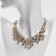 Hollywood necklace circles in patterns, white color in gold, 30 cm