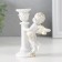 Polystone candlestick for 1 candle "Angel on a column" D-1.2 cm white with gold 9.8x8x7 cm
