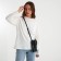 Female Cross-Bodi Bag on the button, black color