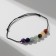 Bracelet of desires "7 chakras" on a black thread, the length is regulated
