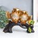 Polystone souvenir "Two gold owls on a snag" on the chest sun 8x22x17.5 cm