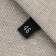 Textile strip “46”, 4.6 x 1.1 cm, black color