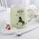 Ceramic mug with a lid and spoon "Golden Horn", 450 ml, color mix
