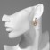 Hanging earrings with rhinestones "Bear" with heart, white color in gold