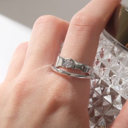 Ring "melting" double, white color in silver, dimensionless-3